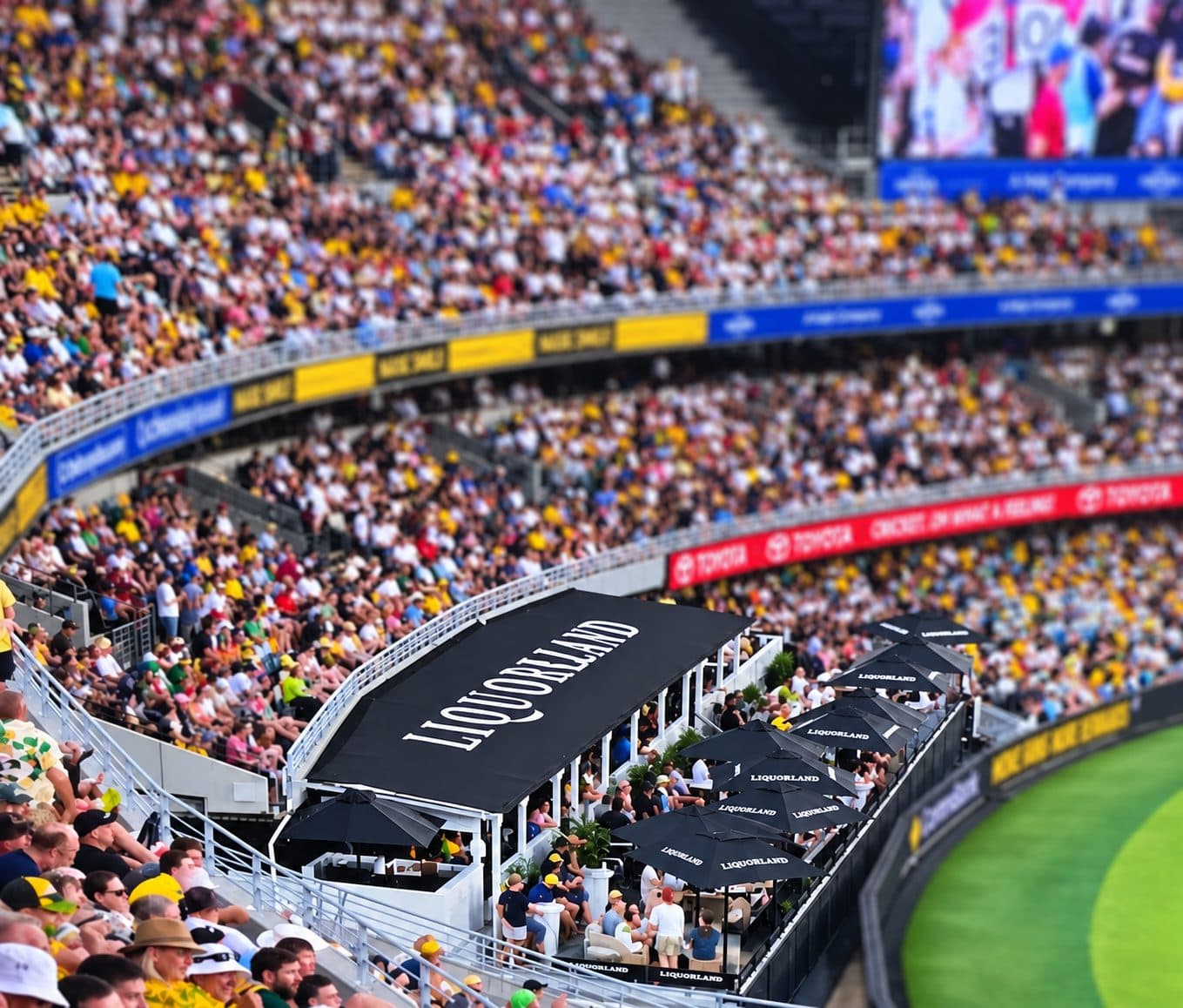 Printed marquee and umbrellas in a stadium corporate area