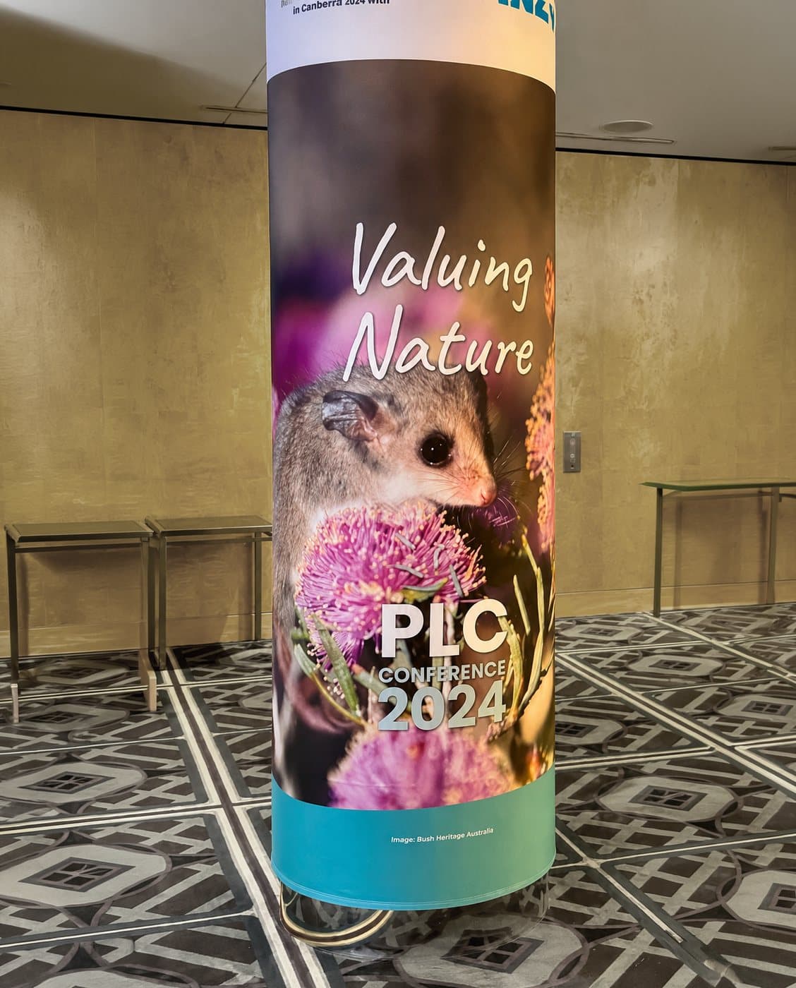 Printed pillar wrap at a conference