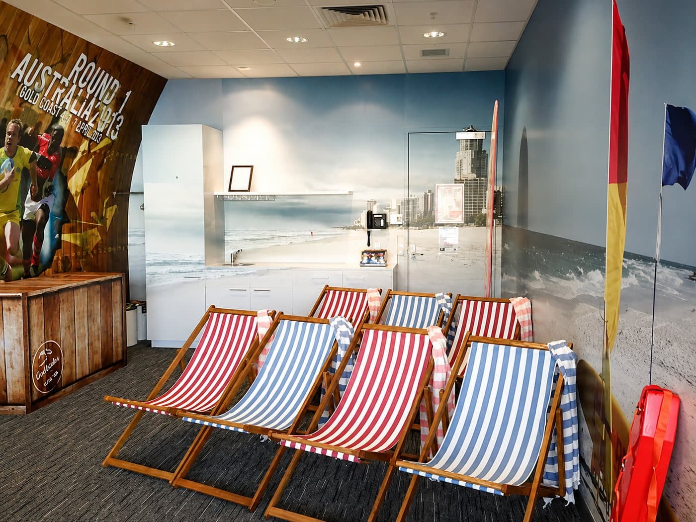 Self-adhesive vinyl and decal installation in a corporate box