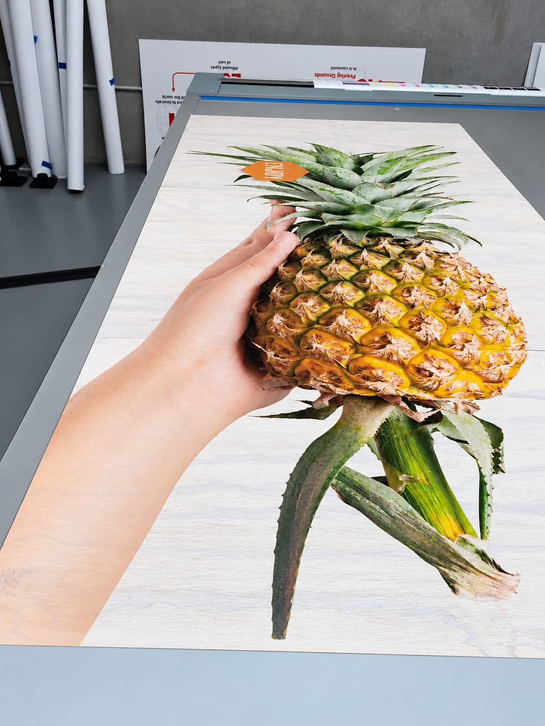 Pineapple graphic printed directly onto melamine board, on the flatbed