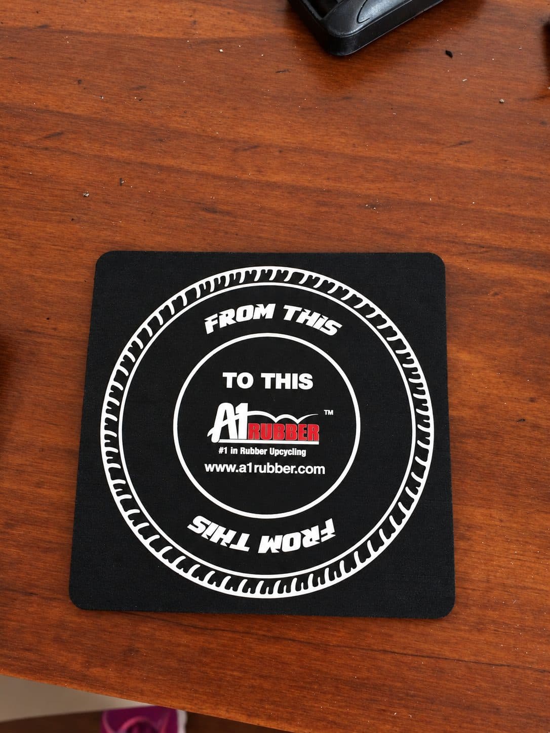 Coaster printed onto recycled tyre rubber