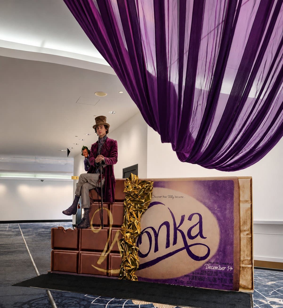 Printed and cut film display built for a cinema foyer